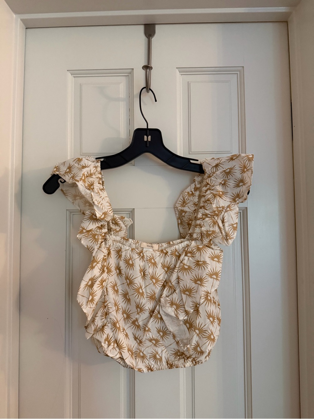 REVOLVE TOP Ruffled Square-Neck Top in Cream with Gold Palm Print